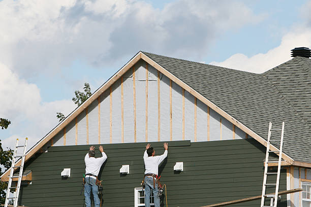 Professional Siding technician working in Ferndale, PA